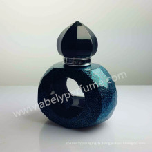 Bouteille de parfum en verre à la décoration minérale de style arabe de luxe